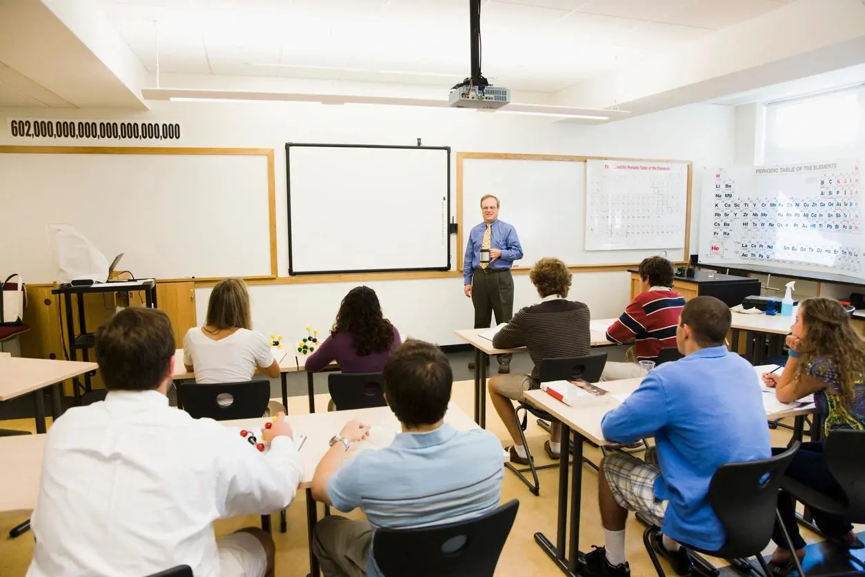 A group of people in a classroom.
