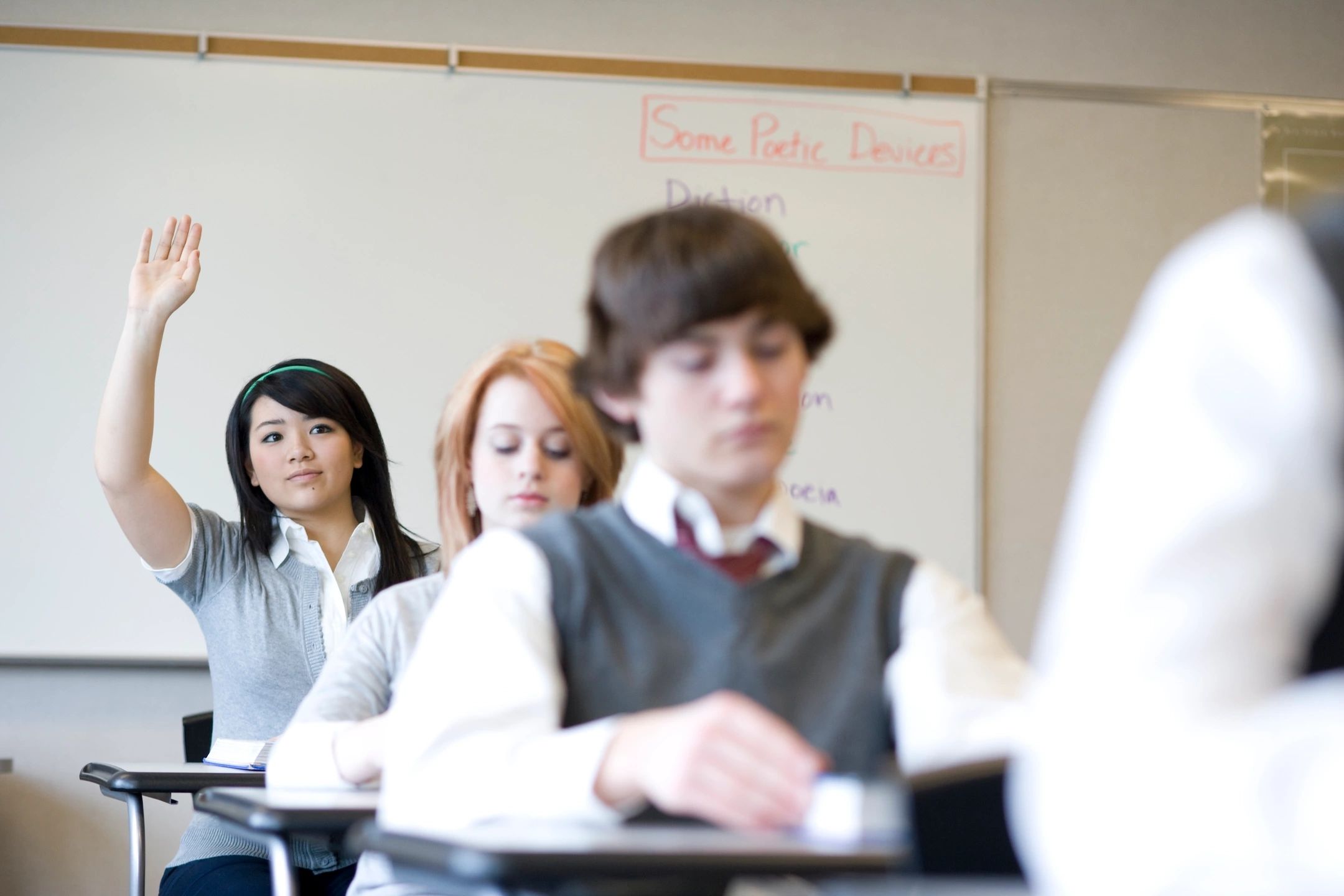 A group of people in a classroom.